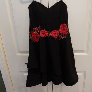 Beautiful strapless black dress with red flowers